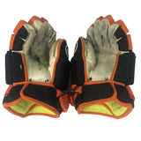 Game-Used 2024-25 Matt Boudens Black/Orange Warrior Hockey Gloves